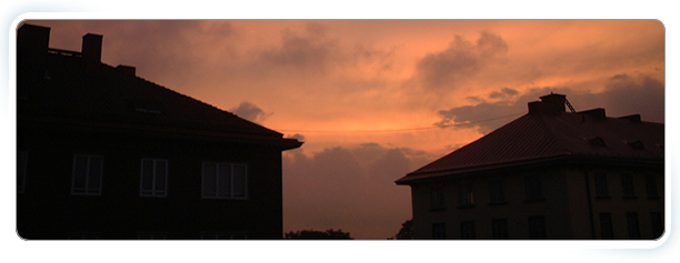 Our Care Homes banner - 2 houses at dusk